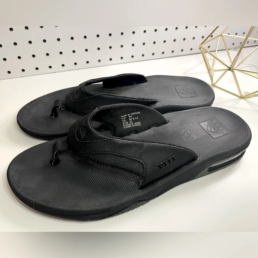 REEF Fanning Men's Bottle Opener Flip Flop, Arch Support, Durable Outsole 12M